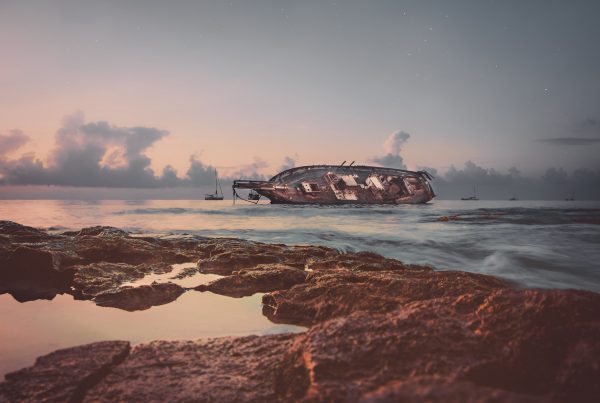 A ship wrecked along a coastline